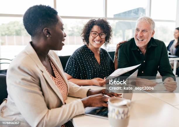 Financial Planning For Early Retirement Stock Photo - Download Image Now - Multiracial Group, Diversity, Business