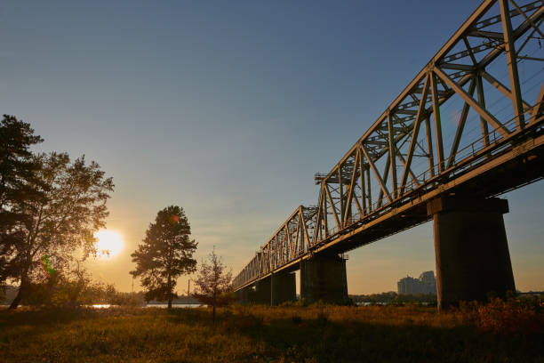 istock Railway bridge over the Dnieper River in Kyiv, Ukraine at sunset 1178856921