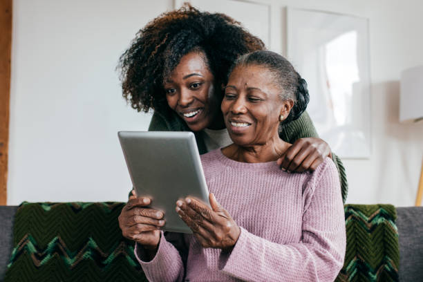 istock Senior women learning new way to use SMART home app 1178859362