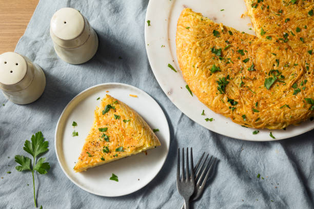 Homemade Spaghetti Omelette with Eggs Homemade Spaghetti Omelette with Eggs and Parsley frittata stock pictures, royalty-free photos & images