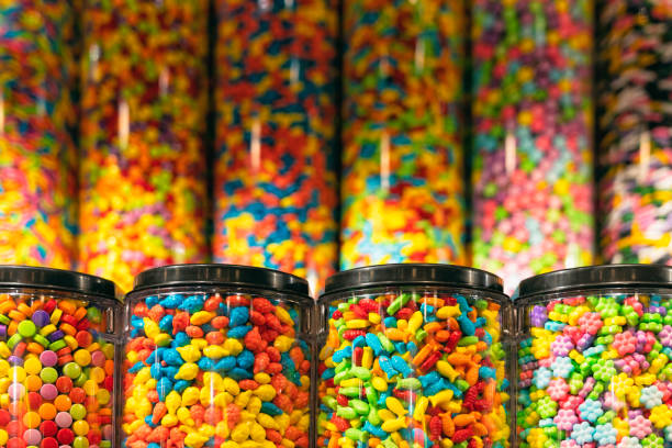 istock Multicolor candies in glass jars for a background. 1178875692