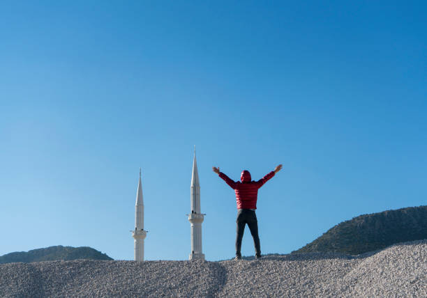 Man and minarets, outdoors