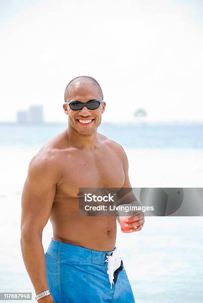 Posing On The Beach Stock Photo - Download Image Now - Adult, Adults Only, African Ethnicity