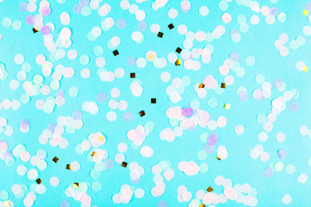 istock Colorful confetti on turquoise background. 1178881523