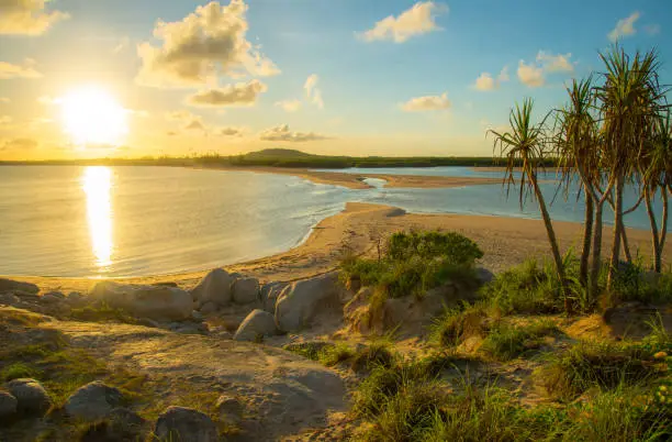 Photo of Dramatic sunrise on East Woody beach an iconic tourist popular place in Nhulunby a township on the Gove Peninsula, NT state of Australia.