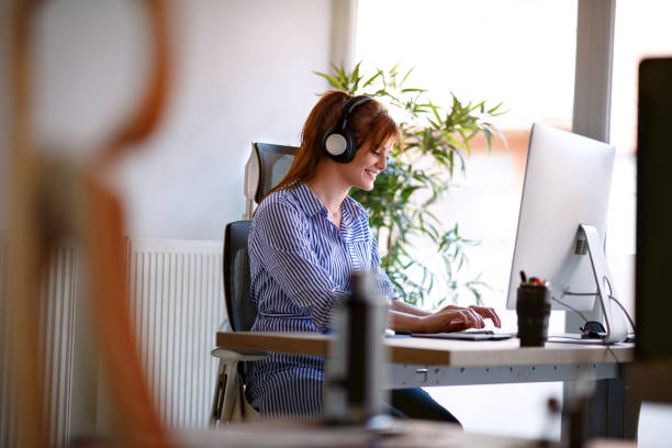istock Team of employees is discussing the project and working overtime in the office with computers 1178883206