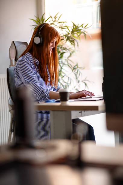 istock Team of employees is discussing the project and working overtime in the office with computers 1178883274