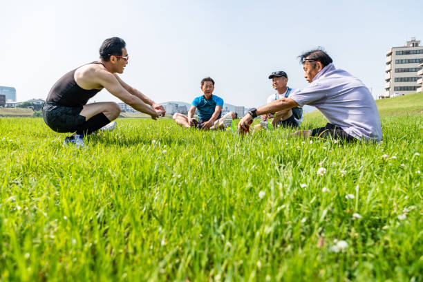 istock Four senior men stretching on the lawn 1178883357