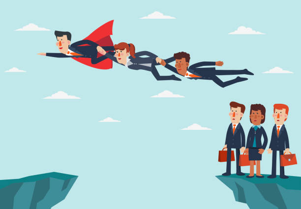 istock Superhero helps business people jump over the cliff 1178884384