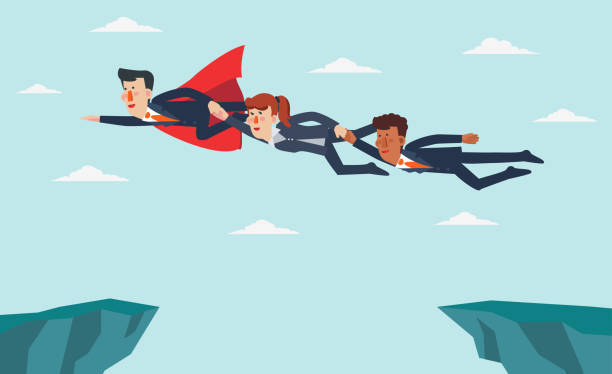 istock Superhero helps business people jump over the cliff 1178884393