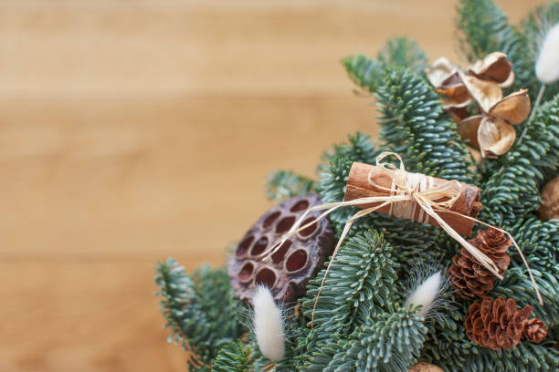 istock Fir tree branches with Christmas decorations on wooden background, space for text, flat lay. Winter season. New Year's, holiday, christmas decoration. 1178885444