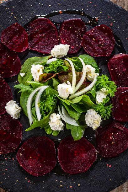 istock Vegetable salad on wooden background 1178887291