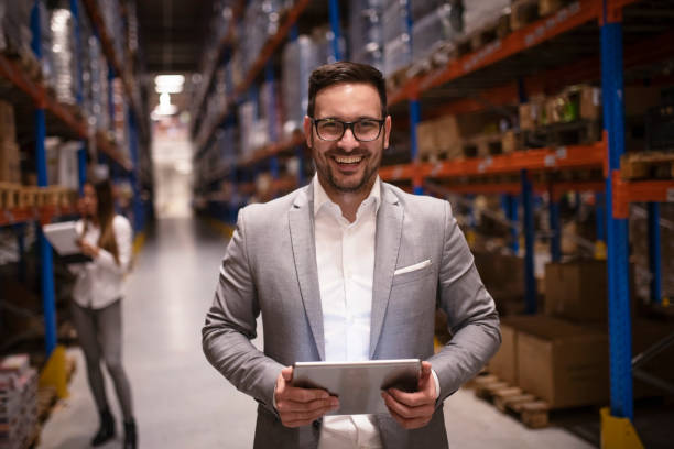 istock Portrait of successful manager at warehouse. 1178890063