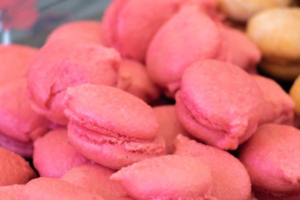 istock Close-up on raspberry and hazelnut macaroons made from Provence delicious cakes from the south of France for gourmet coffee 1178892723