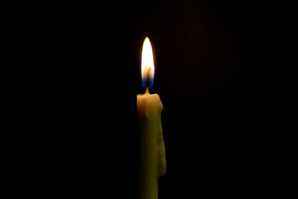 istock Candle light in the black background 1178895356