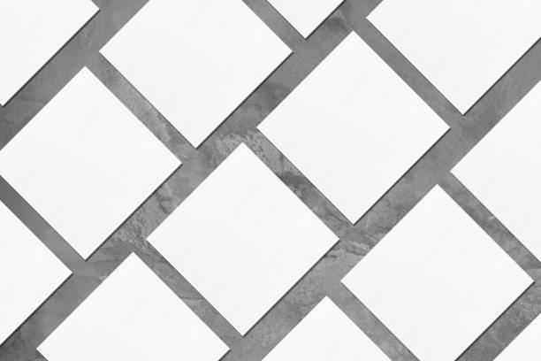 istock empty square business card mockups lying diagonally on grey concrete background 1178896303