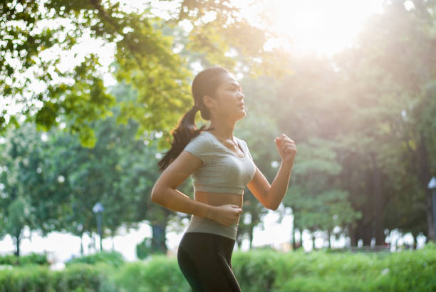 istock Sporty woman doing running workout 1178896541