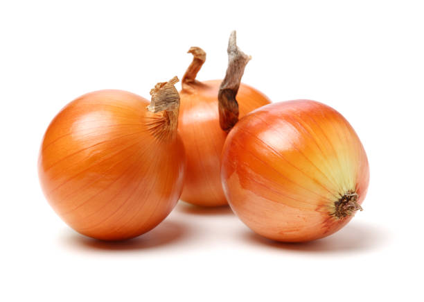 istock Gold onion vegetable bulbs on white background 1178899229