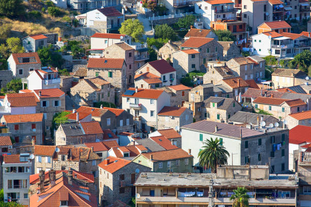 Vis, Croatia, Vis Island - September 5, 2019 : Aerial view on town, typical Mediterranean architecture, colorful roofs