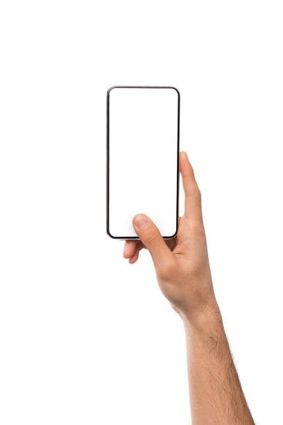 imagen de mockup de la mano masculina sosteniendo el teléfono inteligente con la pantalla en blanco - dispositivo de información móvil fotos fotografías e imágenes de stock