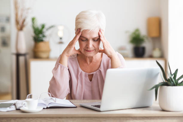 istock Matured business woman feeling tired, overworking at home 1178904980