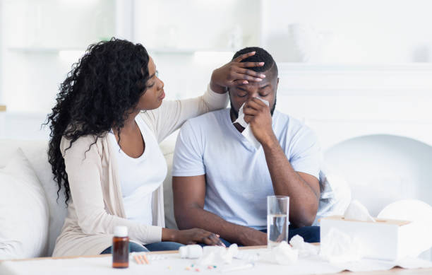 istock Black Woman Looking After Her Sick Husband 1178906757