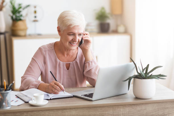 istock Ambitious elderly business lady working from home 1178907902