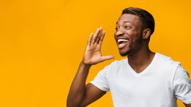istock Funny African American Man Shouting On Yellow Studio Background 1178909446