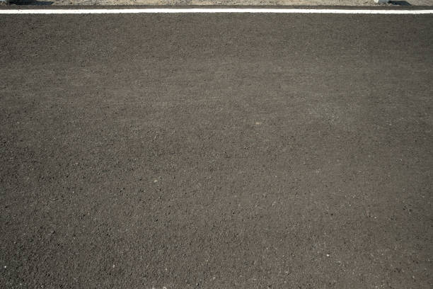 istock Asphalt road with marking lines white stripes texture Background. 1178909609