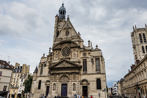 Saint-Étienne-du-Mont is a church in Paris, France, located on the Montagne Sainte-Geneviève in the 5th arrondissement, near the Panthéon. It contains the shrine of St. Geneviève, the patron saint of Paris.