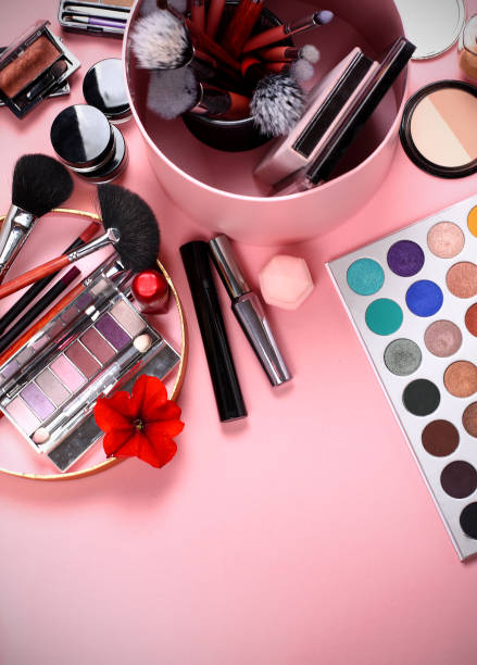 istock makeup brushes and cosmetics on a pink background, storage box 1178910126