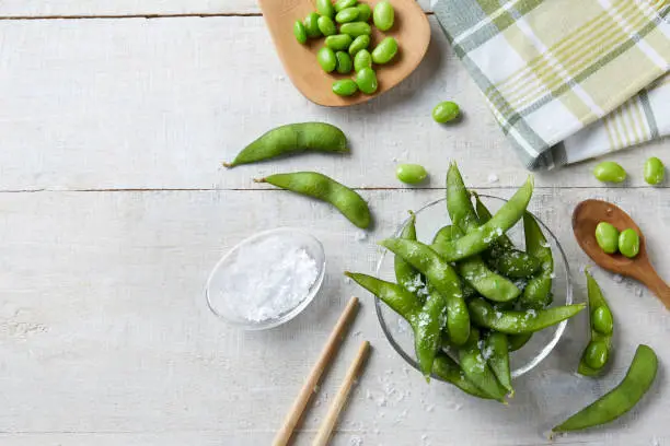 Edamame_Fresh boiled green Soybeans snack on a table