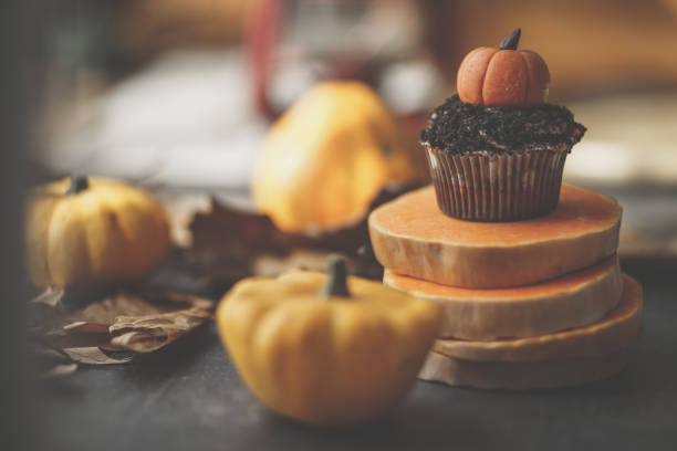 istock Chocolate Halloween muffin and pumpkin slices 1178915063