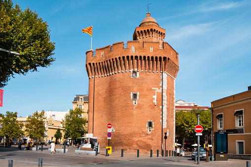 Perpignan, France - September 14, 2019: A view of Le Castillet fortress in Perpignan, France, an iconic landmark in the city, built of bricks on the fourteenth century