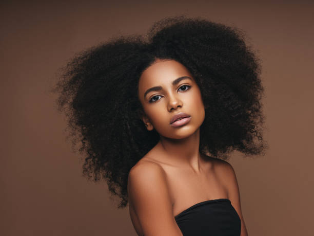 istock Beautiful girl with curly hairstyle 1178916683