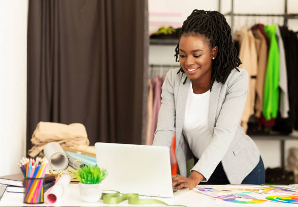 istock African American Dressmaker Using Laptop Working In Showroom 1178917563