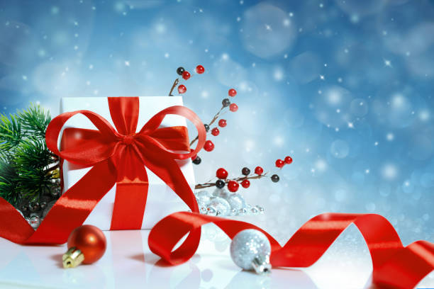 istock Christmas gift with decoration on blue bokeh background 1178920911