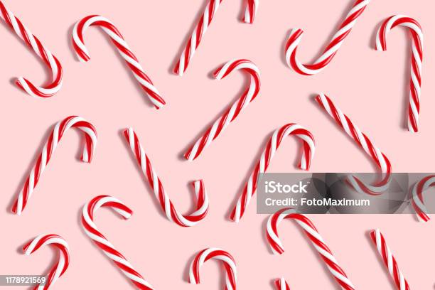 Candy Cane For Party Design On Pink Background Stock Photo - Download Image Now - Christmas, Backgrounds, Candy Cane