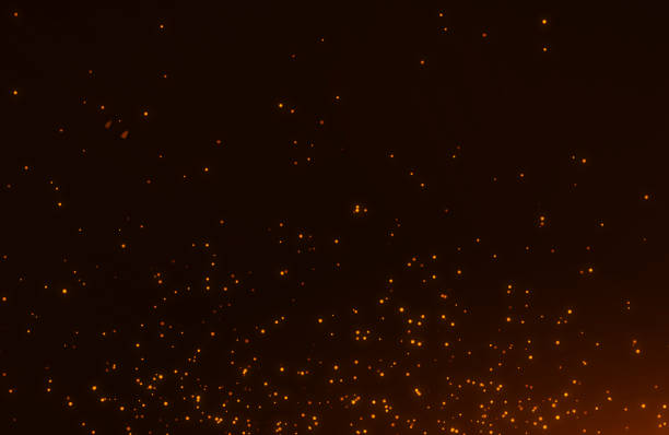 istock Abstract background of flickering gold particles and light flare 1178921573