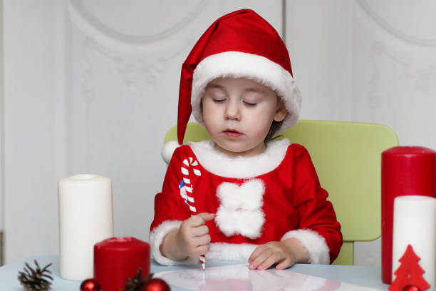 istock Little kid are writing letter to Santa 1178922570