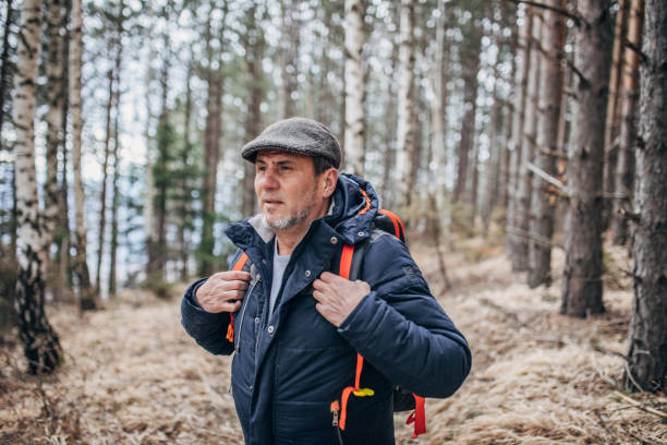 istock Senior man hiking 1178923806