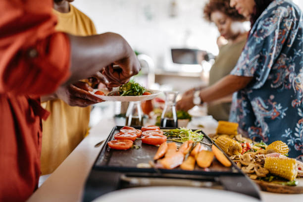 istock Teamwork in the kitchen for preparation of healthy meal 1178925342