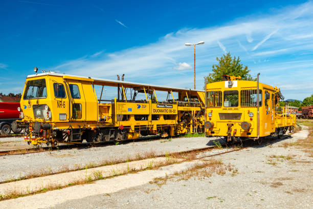Ljubljana, Slovenia: Two service-maintenance type trains in The Slovenian Railway Museum stock photo