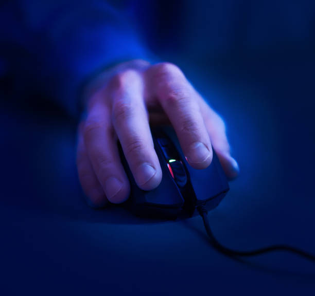 istock Male gamer hand on computer mouse, crop 1178926331