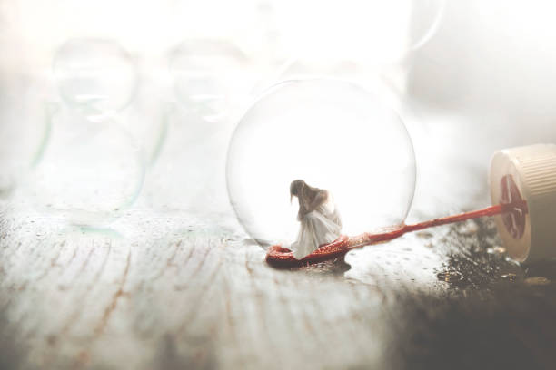 small woman inside a soap bubble, concept of imagination and introspection