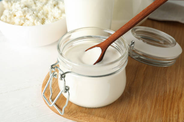 istock Fresh dairy products on white wooden table, close up 1178929138
