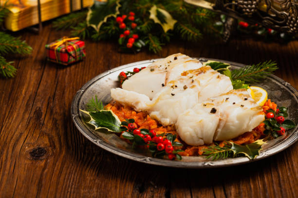 istock Christmas fish. Roasted cod pieces, served in vegetable sauce. 1178929889