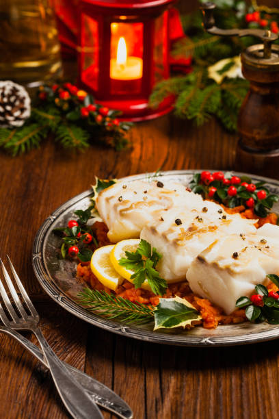 istock Christmas fish. Roasted cod pieces, served in vegetable sauce. 1178929958