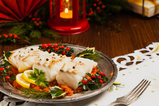istock Christmas fish. Roasted cod pieces, served in vegetable sauce. 1178930697