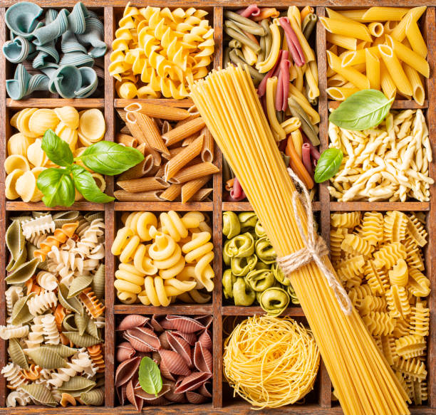istock Assorted colorful italian pasta in wooden box 1178931138